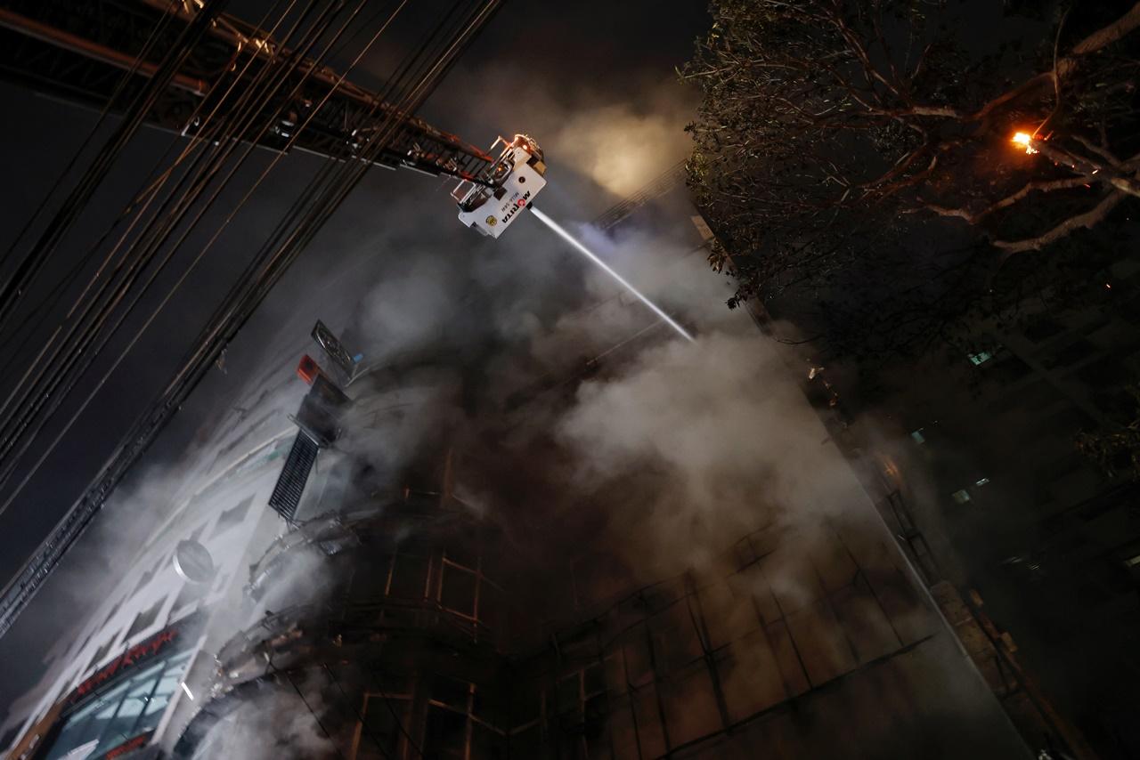 A fire in a high-rise building in Dhaka at midnight on February 29, 2024