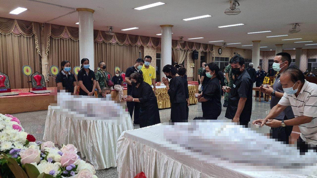 Watering the bodies of 3 railway officials killed in a railway explosion in Songkhla at Khok Samankhun Temple