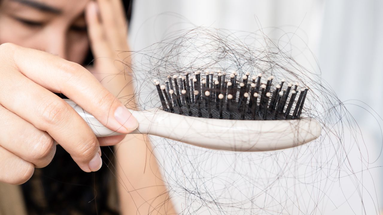 What causes a lot of hair loss?