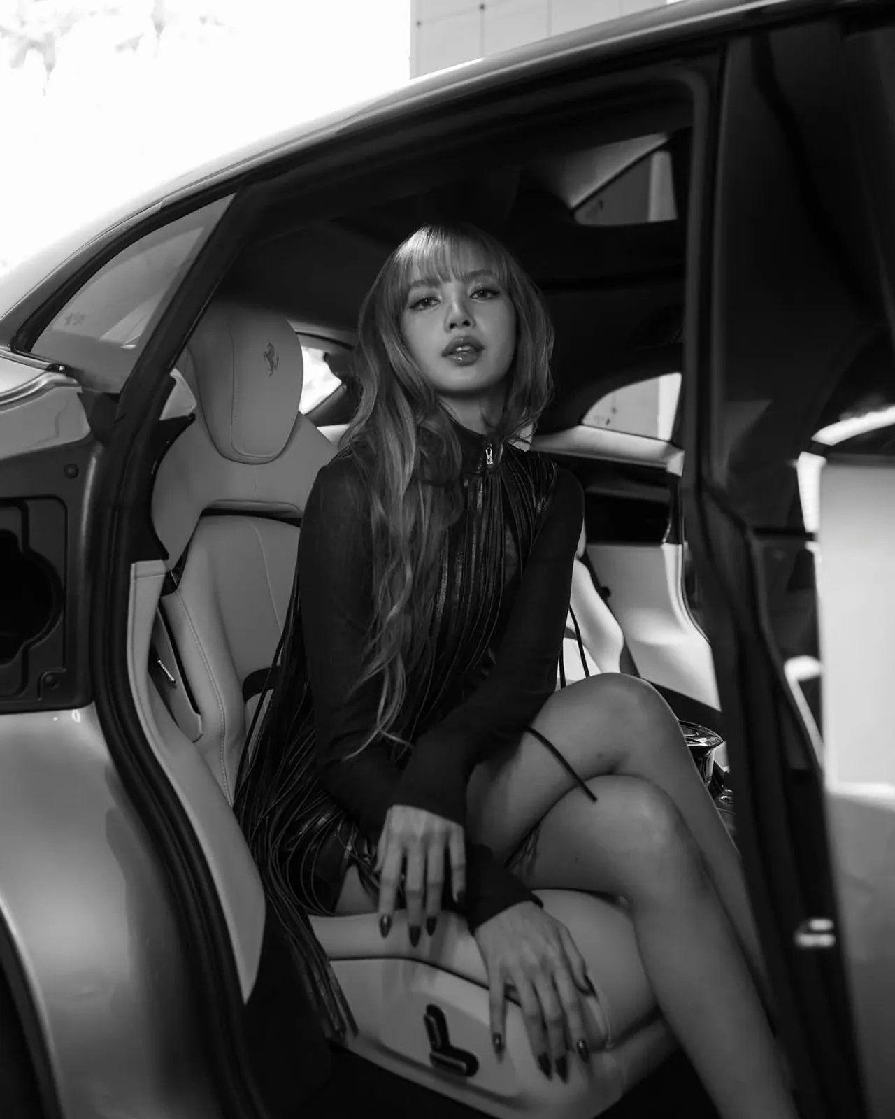 ลิซ่า ลลิษา สุดปัง ปรากฏตัวในงานแข่งรถ F1 ในฐานะแขกคนสำคัญของเฟอร์รารี