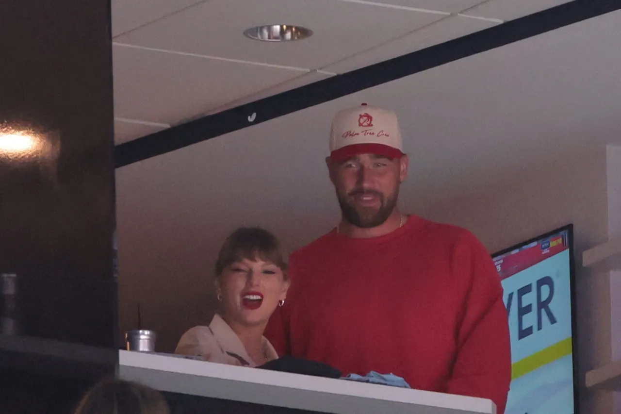 Taylor Swift and Travis Kelce engagement photo