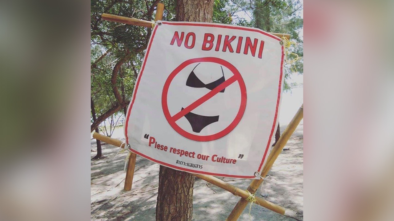 ถกสนั่นโซเชียล ป้ายอ้างวัฒนธรรม ห้ามสวมบิกินีเล่นน้ำ เกาะแสมสาร