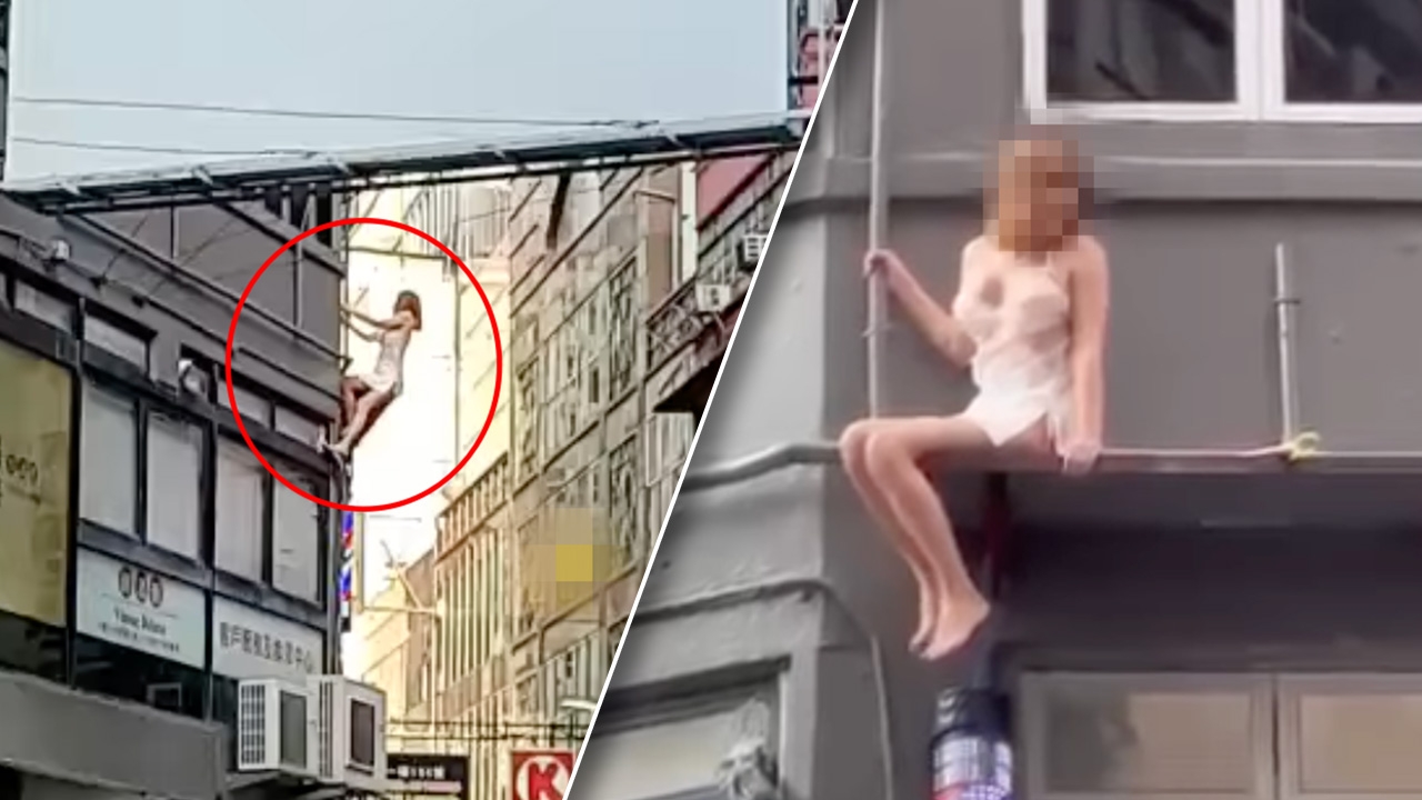 สไปเดอร์เกิร์ล สาวสองชาวไทย ปีนลงจากตึกหนีตำรวจ (คลิป)