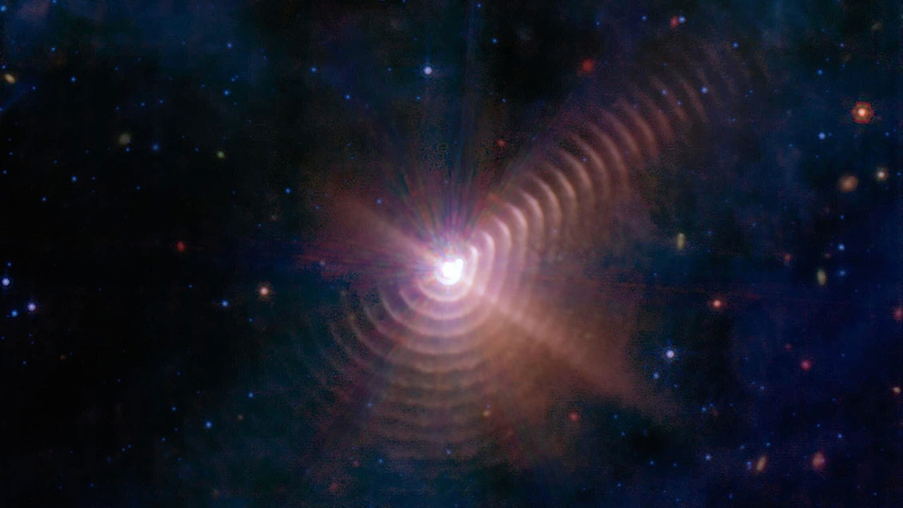 วงแหวนฝุ่นปล่อยจากดาวคู่ ดาววูล์ฟ-ราเยท์ ที่โคจรมาใกล้กัน