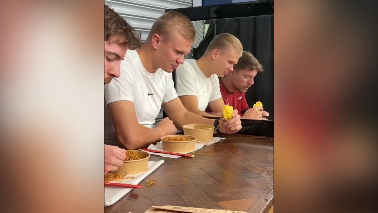 Which Looks More Real? Comparing the Real Clip vs. AI Clip of Erling Haaland and the Meme Sitting Eating by the Glass (Video)